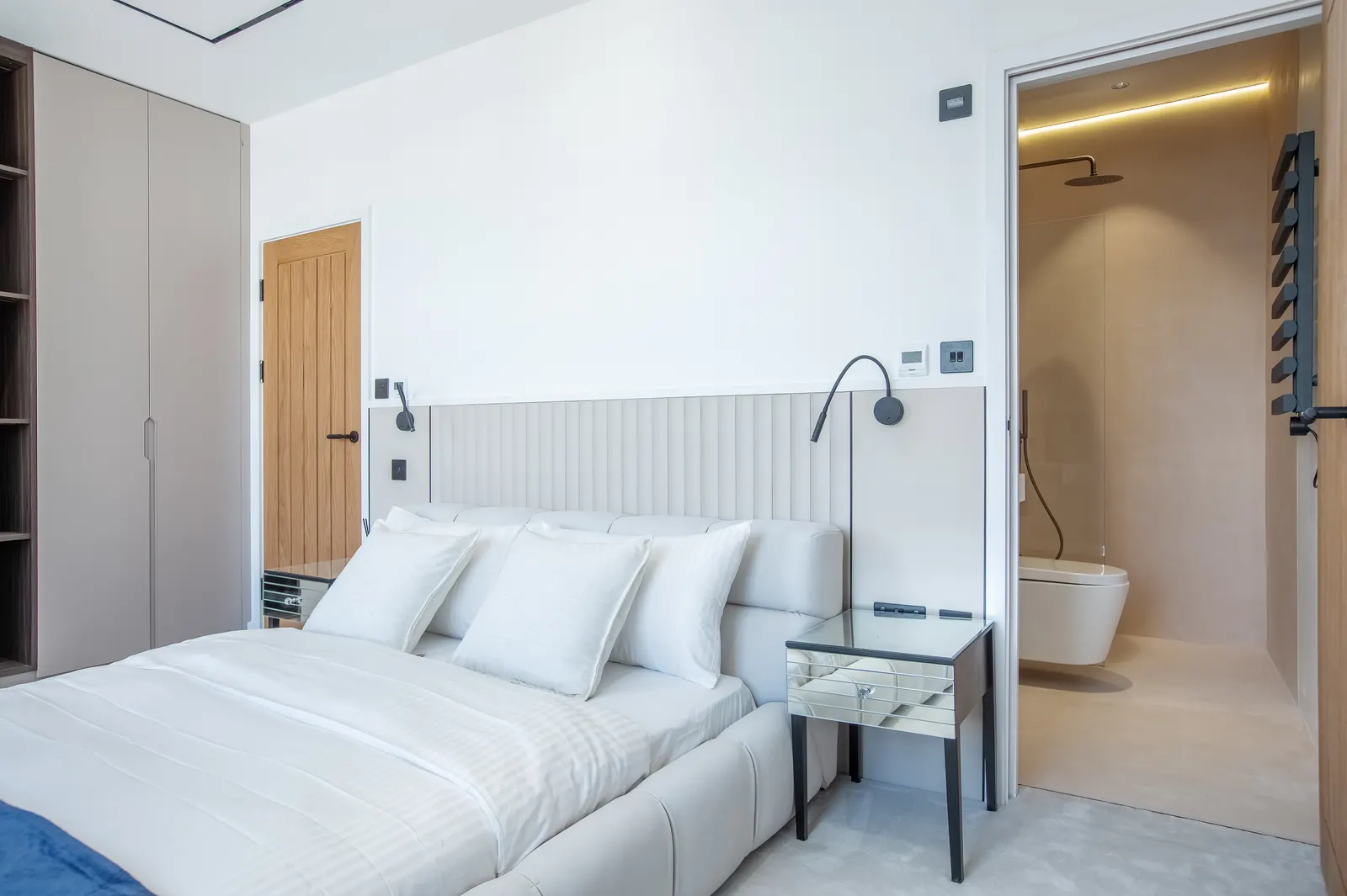 Bedroom with upholstered headboard