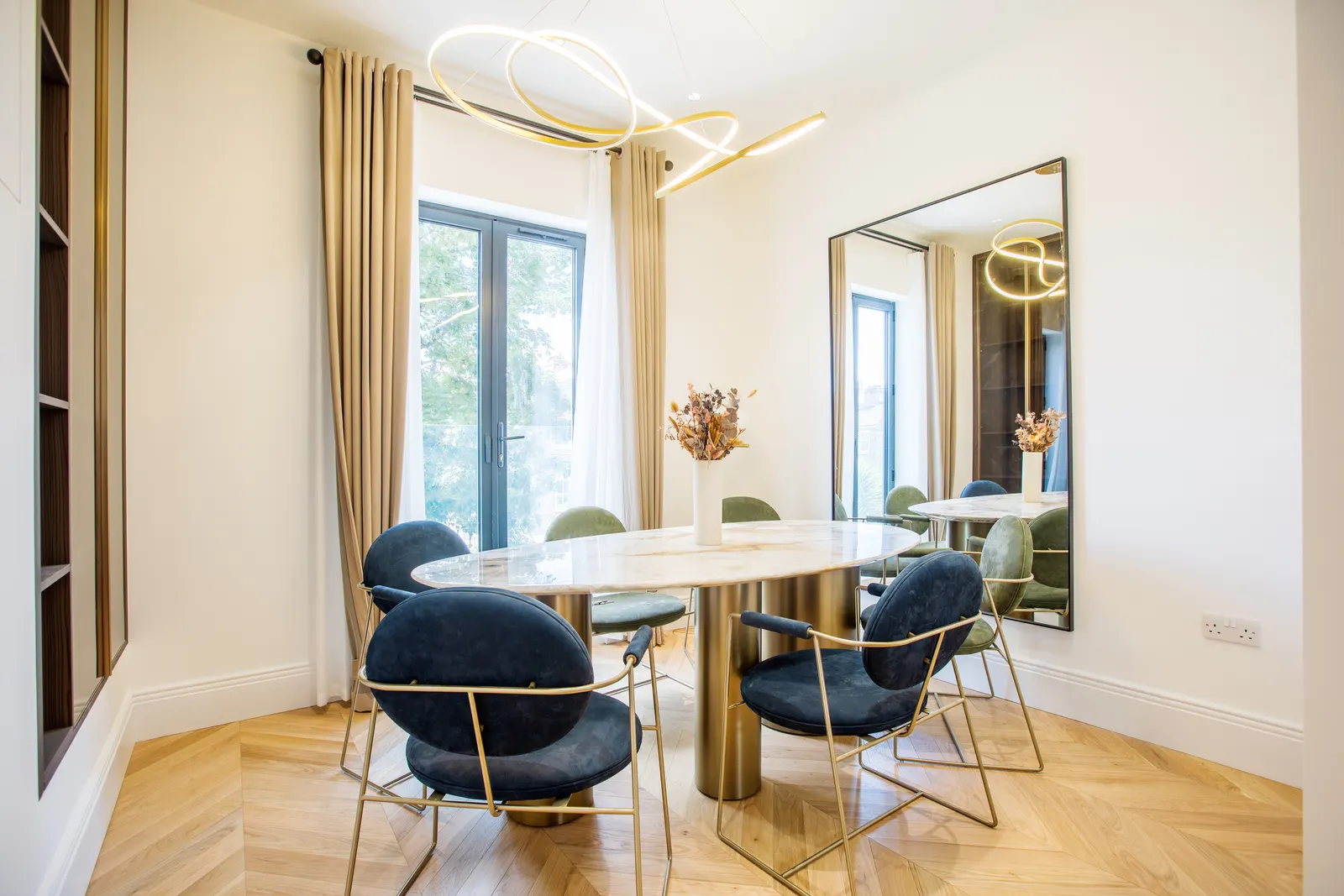 Dining area with round table and pendant light