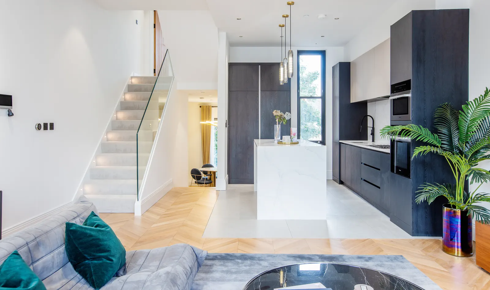 Open-plan living space with staircase