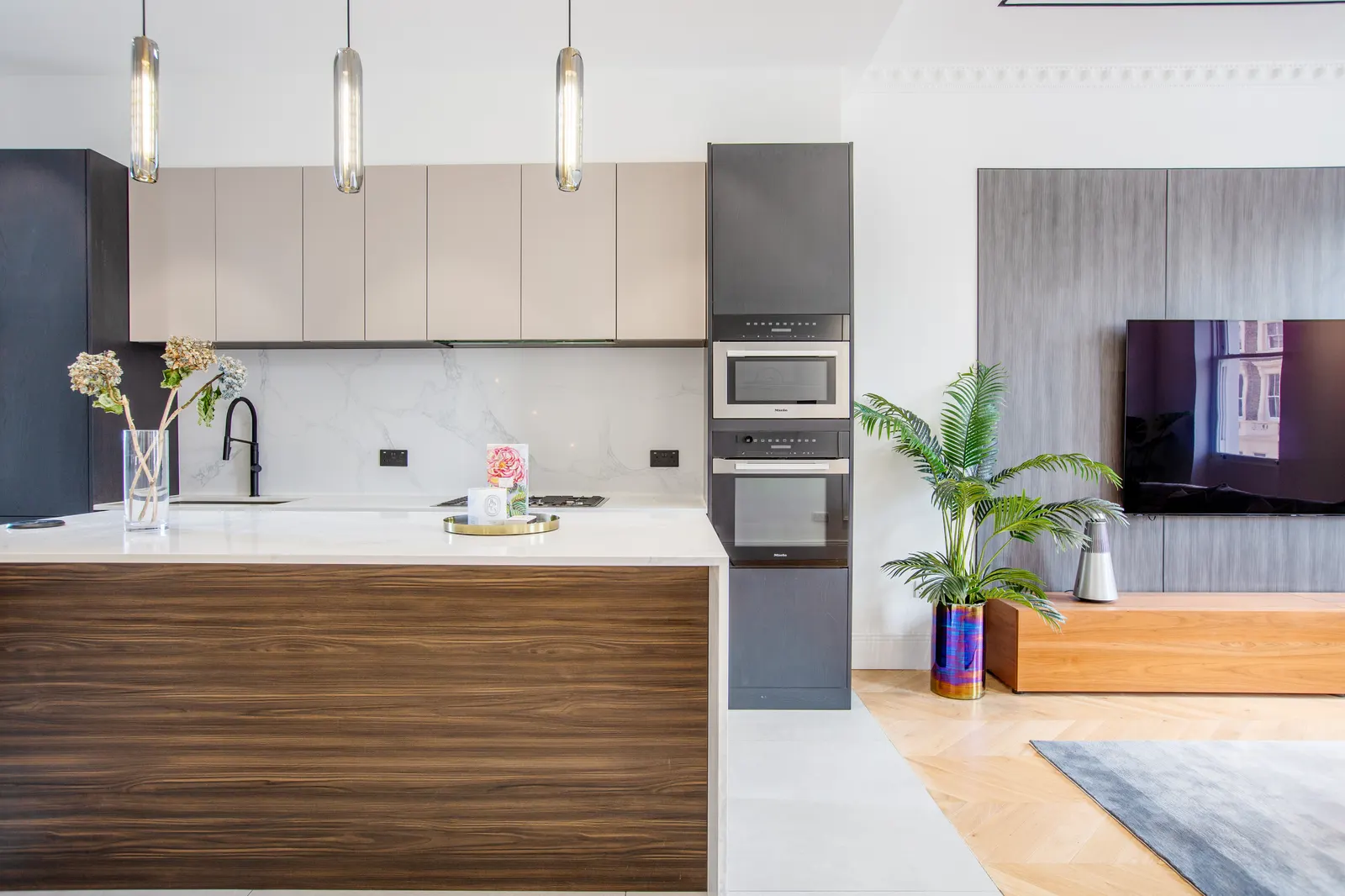 Kitchen island with TV and bar seating