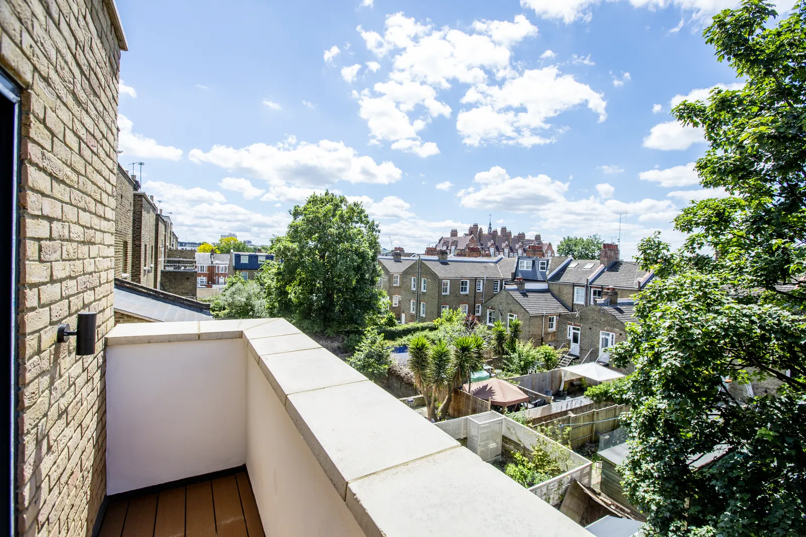 Terrace with brick wall and open sky