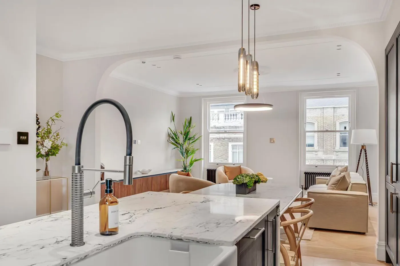 Kitchen tap and marble worktop detail