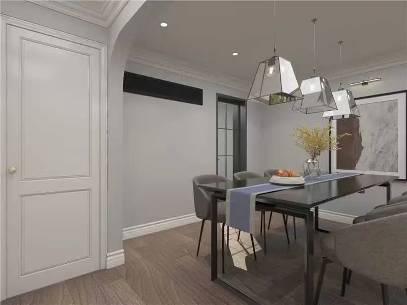Dining space with brass pendant lights